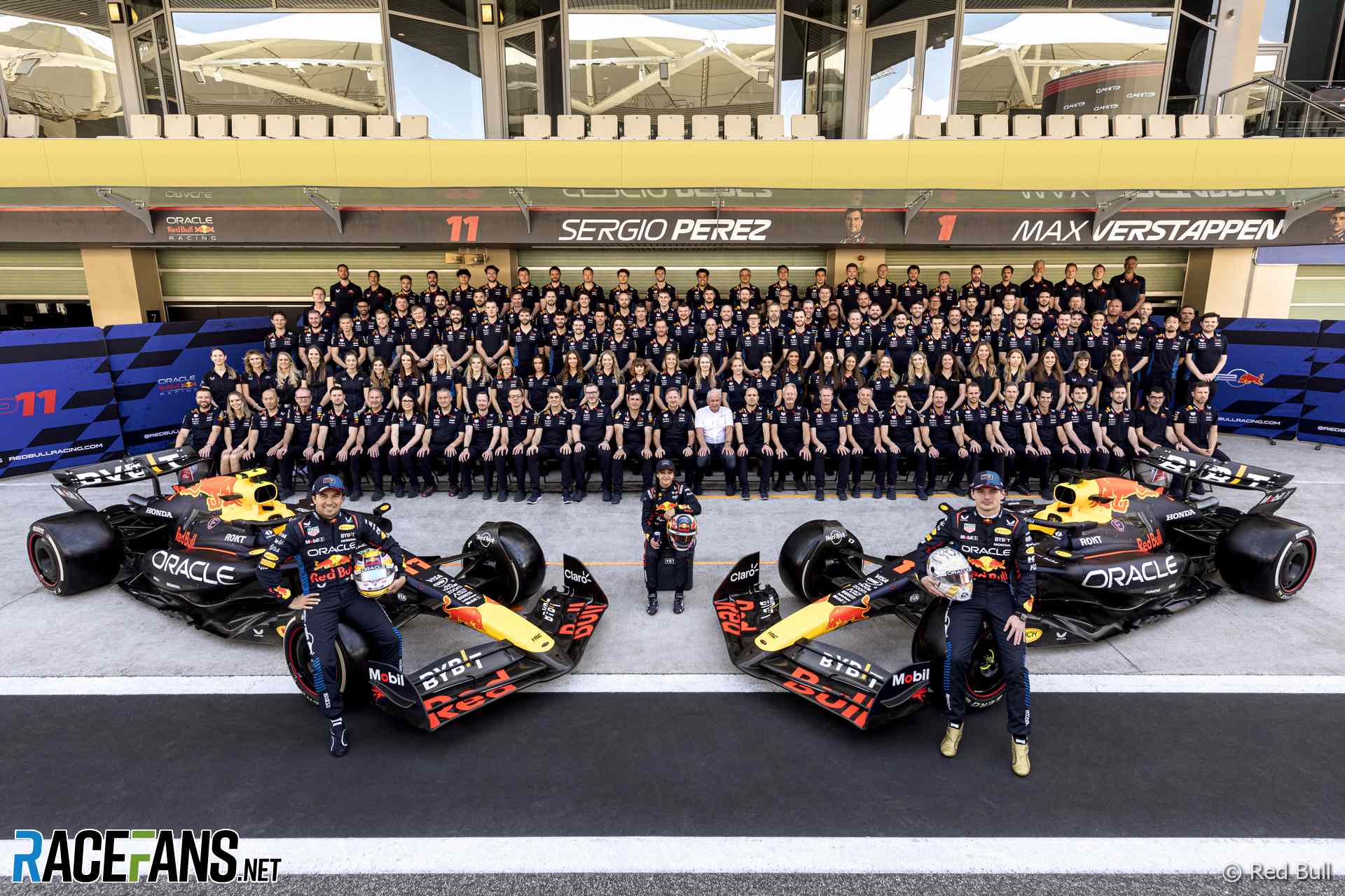 Max Verstappen, Sergio Perez and Red Bull team members, Yas Marina, 2024